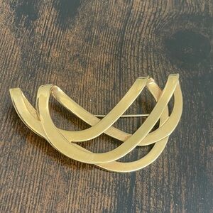 Goldtone brooch pin